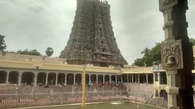 The Golden Lotus tank at Meenakshi Amman with the south gopuram rising behind it